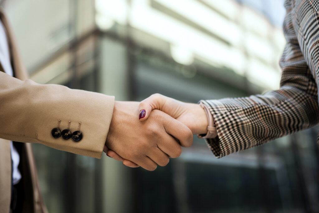 man and woman signing up to distribute nuttelex